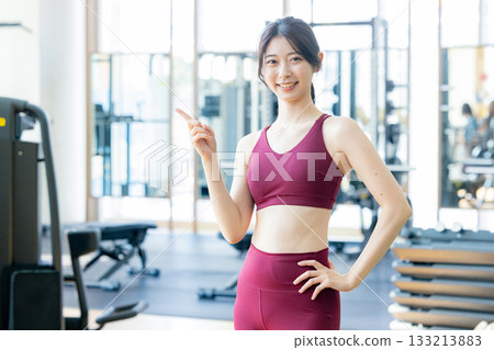 Woman training at the gym Woman training at the gym 133213883