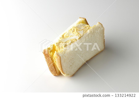Egg sandwich photographed alone on a white background Egg sandwich photographed alone on a white background 133214922