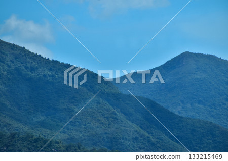 Close-up of the mountains with blue sky. Nature scene. 133215469