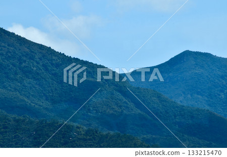 Close-up of the mountains with blue sky. Nature scene. 133215470