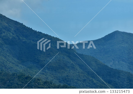 Close-up of the mountains with blue sky. Nature scene. Close-up of the mountains with blue sky. Nature scene. 133215473