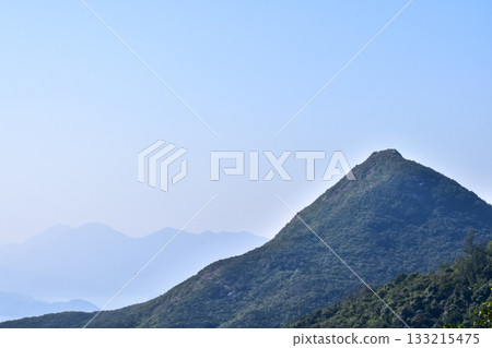 Close-up of the mountains with blue sky. Nature scene. Close-up of the mountains with blue sky. Nature scene. 133215475