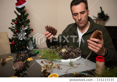 Family Crafting Christmas Decor: Pine Cones, Wreaths, And Cozy Holiday Centerpiece Project Family Crafting Christmas Decor: Pine Cones, Wreaths, And Cozy Holiday Centerpiece Project 133215535