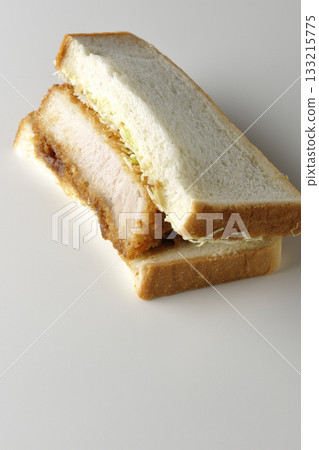 Thick cutlet sandwich photographed alone on a white background 133215775