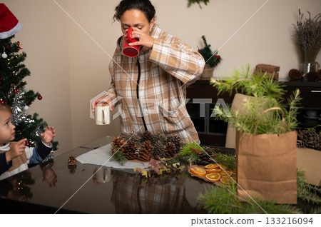 Family Christmas Crafting At Home With Pinecones, Dried Oranges, And Cozy Holiday Vibes Family Christmas Crafting At Home With Pinecones, Dried Oranges, And Cozy Holiday Vibes 133216094