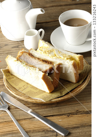 Thick-cut cutlet sandwich, egg sandwich and tea Thick-cut cutlet sandwich, egg sandwich and tea 133216243