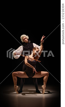 Expressive ballet pose guided by classical mentor in emotional body-as-instrument artwork Expressive ballet pose guided by classical mentor in emotional body-as-instrument artwork 133216304