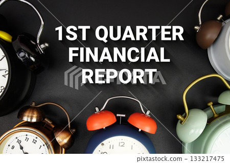 1st Quarter Financial Report text with alarm clock on black background 1st Quarter Financial Report text with alarm clock on black background 133217475