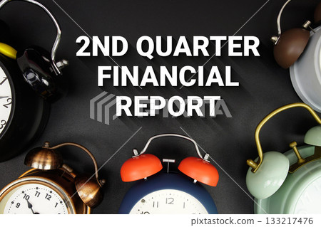 2nd Quarter Financial Report text with alarm clock on black background 2nd Quarter Financial Report text with alarm clock on black background 133217476