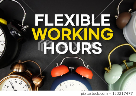 Flexible Working Hours text with alarm clock on black background 133217477