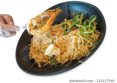 Top view of Stir Fried Rice Vermicelli with Water Mimosa and Shrimp, focus selective Top view of Stir Fried Rice Vermicelli with Water Mimosa and Shrimp, focus selective 133217540