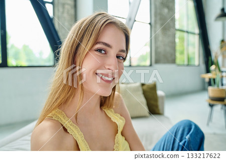 Close-up selfie portrait of teenage female looking at web camera Close-up selfie portrait of teenage female looking at web camera 133217622