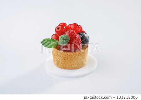 Summer fruits. Seasonal delicious tart against white background Summer fruits. Seasonal delicious tart against white background 133218006