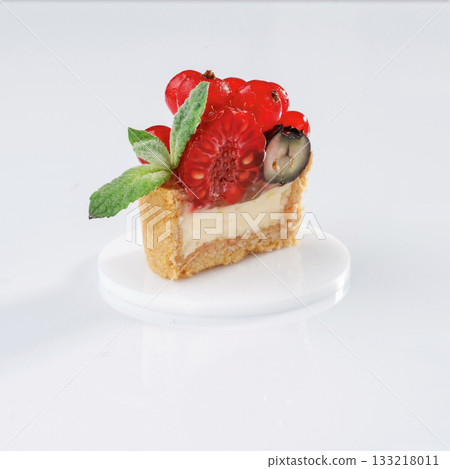 Summer fruits. Seasonal delicious tart against white background 133218011