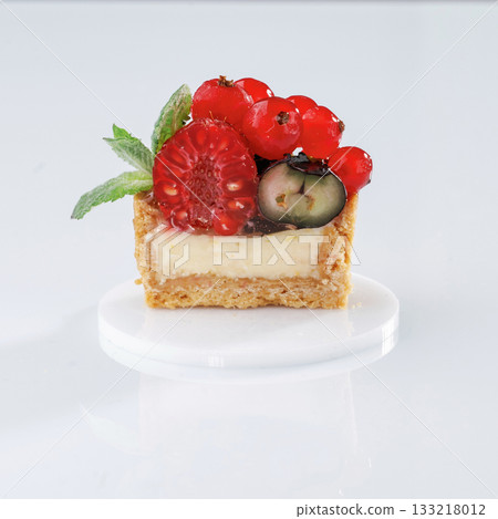 Served, ready to eat. Seasonal delicious tart against white background 133218012