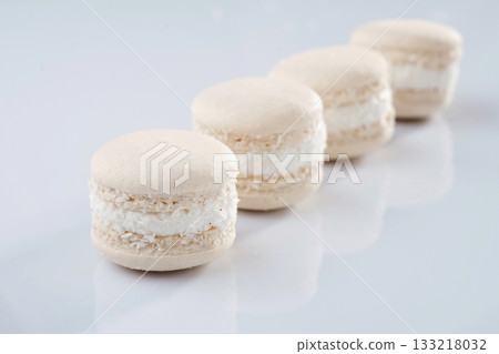 Close up view. Bunch of macarons on the white surface 133218032