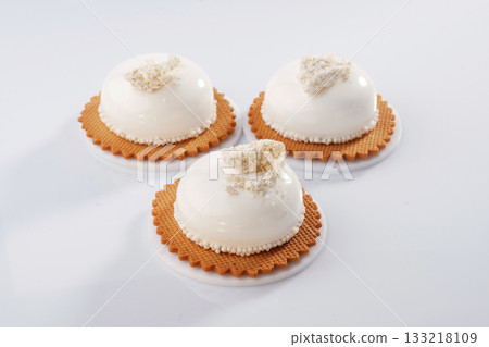 Lot of sugar. Sweet cakes on the white surface 133218109