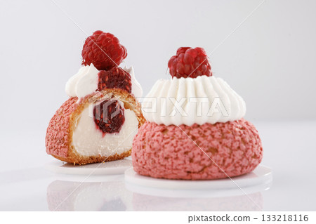With raspberry on top. Seasonal delicious tart against white background With raspberry on top. Seasonal delicious tart against white background 133218116