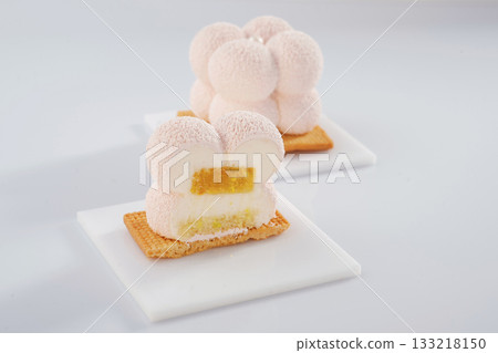 Professional bakery. Delicious cake against white background 133218150