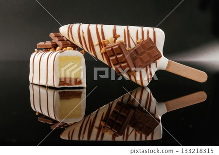Side view. Tasty cheesecakes on the black background Side view. Tasty cheesecakes on the black background 133218315