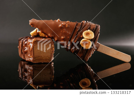 Side view. Tasty cheesecakes on the black background 133218317