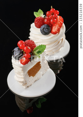 Summer fruit mix. Delicious cake against black background 133218339