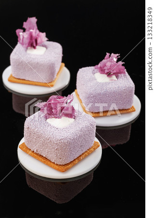Ready to eat. Delicious cake against black background Ready to eat. Delicious cake against black background 133218349