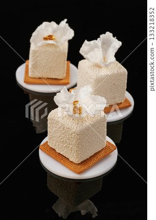 Ready to eat. Delicious cake against black background Ready to eat. Delicious cake against black background 133218352