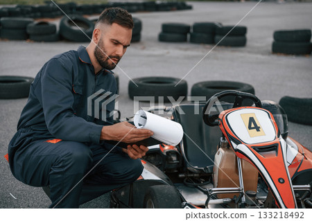 Man is outdoors, kart racing conception 133218492