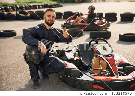 Man is outdoors, kart racing conception 133218570