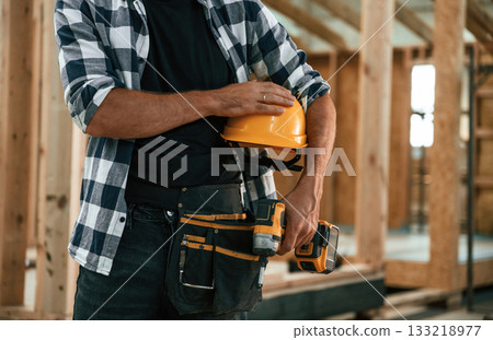 Industrial worker in wooden warehouse 133218977