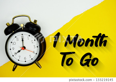 1 Month To Go text and alarm clock on yellow background 133219145