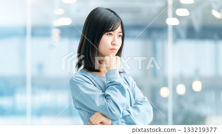 A woman thinking/businesswoman A woman thinking/businesswoman 133219377