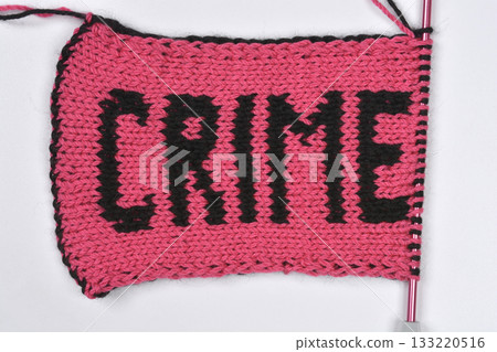 Knitted square with the word "CRIME" 133220516
