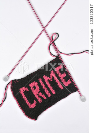 Knitted square with the word "CRIME" 133220517