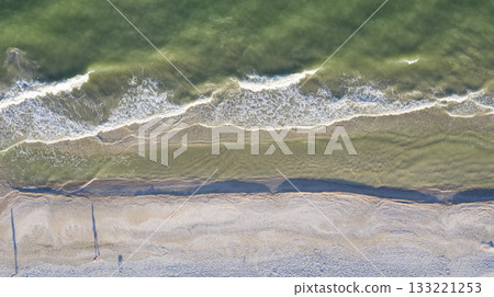sandy beach on the seashore, view from above sandy beach on the seashore, view from above 133221253