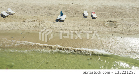 sandy beach on the seashore, view from above sandy beach on the seashore, view from above 133221255