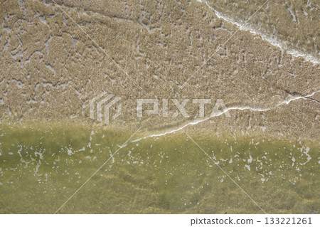 sandy beach on the seashore, view from above sandy beach on the seashore, view from above 133221261