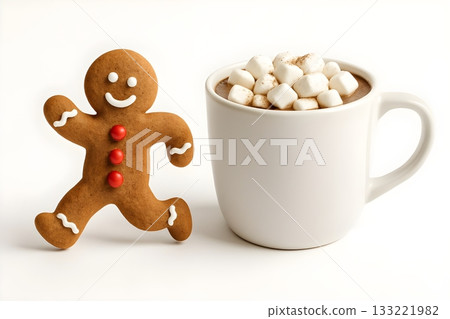 Smiling gingerbread man cookie beside a white mug of hot chocolate topped with marshmallows 133221982