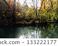 Monasterio de Piedra featuring autumn forest reflecting on lake 133222177