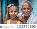 Indian grandfather showing affection to grandson in village 133222892