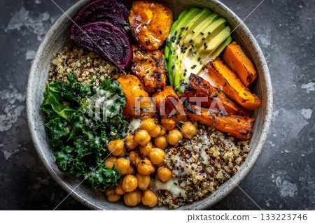 Buddha bowl with quinoa, avocado, chickpeas, kale 133223746