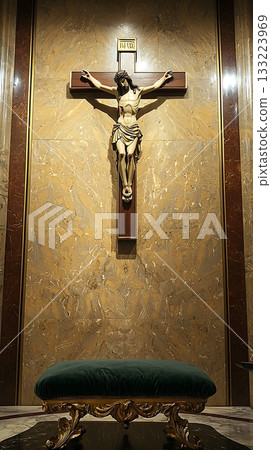Wooden cross with a statue of Jesus Christ on top of it 133223969