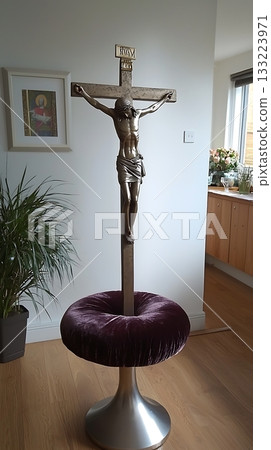 Crucifix is on a stand with a purple cushion Crucifix is on a stand with a purple cushion 133223971