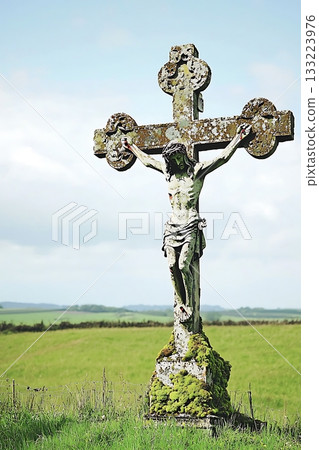 Cross with a statue of Jesus Christ on top of it Cross with a statue of Jesus Christ on top of it 133223976