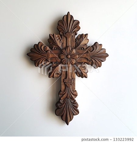 Wooden cross with a flower design on it Wooden cross with a flower design on it 133223992