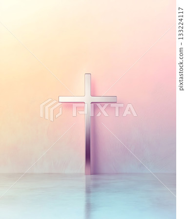 Silver cross is standing in front of a pink wall Silver cross is standing in front of a pink wall 133224117