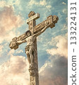 Cross with Jesus Christ holding the cross 133224131