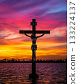 Cross with Jesus Christ on it is in the water 133224137