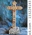 Wooden cross with a blue background 133224143